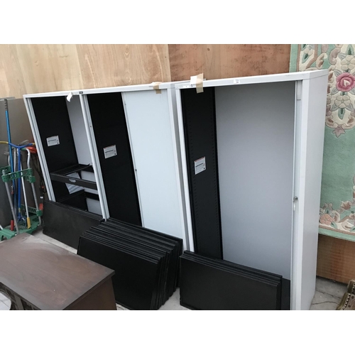 59 - THREE METAL CABINETS WITH CONCERTINA DOORS AND SHELVING