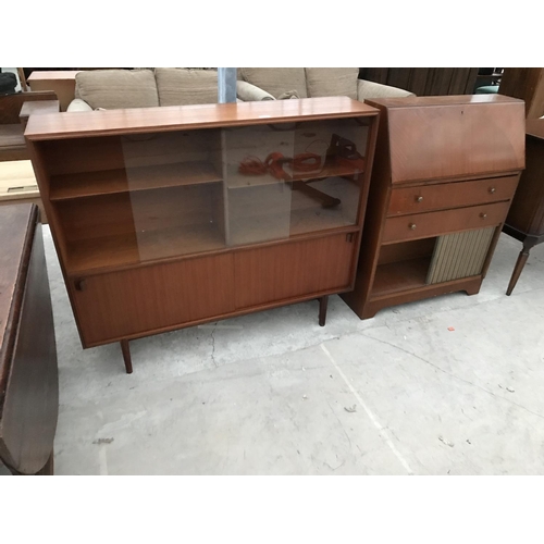 807 - A MULTIWIDTH RETRO TEAK BOOKCASE WITH FOUR SLIDING DOORS (TWO GLASS) AND A TEAK BUREAU WITH FALL FRO... 