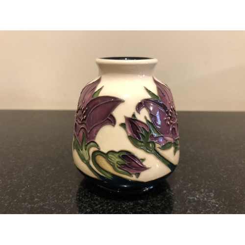 312 - A MOORCROFT POTTERY VASE DECORATED IN THE 'PULSATILLA' PATTERN DESIGNED BY VICKY LOVATT, SHAPE NUMBE... 