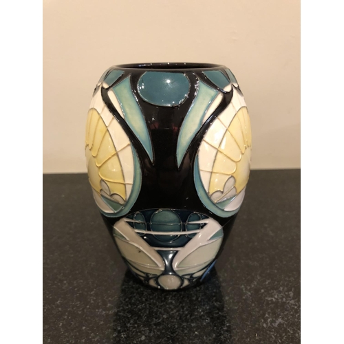 317 - A MOORCROFT POTTERY VASE DECORATED IN THE 'RISING MOON' PATTERN DESIGNED BY VICKY LOVATT FOR THE STA... 