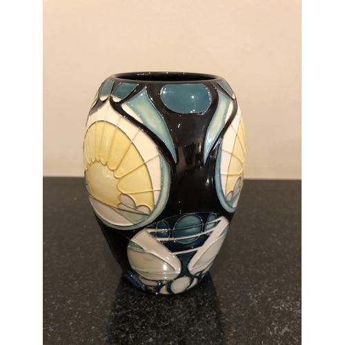 317 - A MOORCROFT POTTERY VASE DECORATED IN THE 'RISING MOON' PATTERN DESIGNED BY VICKY LOVATT FOR THE STA... 