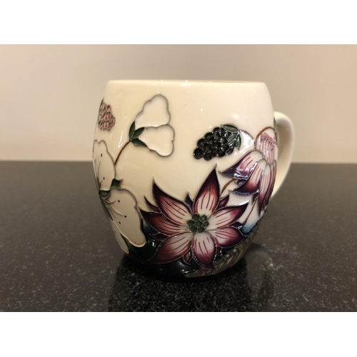 324 - A MOORCROFT POTTERY MUG DECORATED IN THE 'BRAMBLE REVISITED' PATTERN DESIGNED BY ALICIA AMISON, SHAP... 