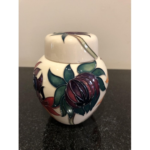 332 - A RARE MOORCROFT POTTERY 'MASTER' (AS CONFIRMED BY ELISE ADAMS) LIDDED VASE DECORATED IN THE 'RUBY R... 