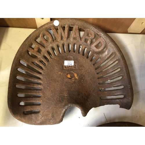 204 - A 'HOWARD, GP2' VINTAGE CAST METAL TRACTOR SEAT WITH PIERCED GALLERY BACK