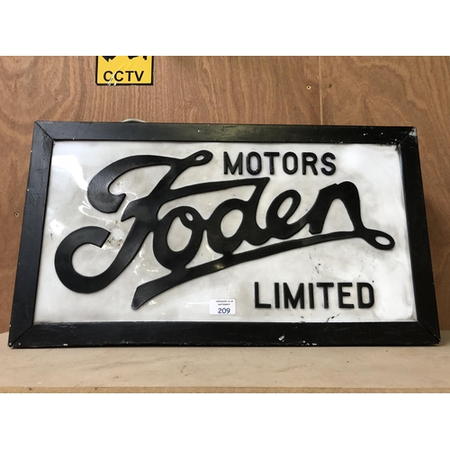 209 - A VINTAGE 'FODEN MOTORS LIMITED' ADVERTISING SIGN IN PAINTED BLACK METAL BOX, LENGTH 62CM