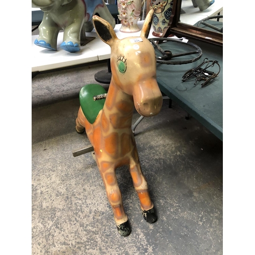 226 - A VINTAGE FAIRGROUND SEATED MODEL RIDE OF A GIRAFFE, HEIGHT 106CM