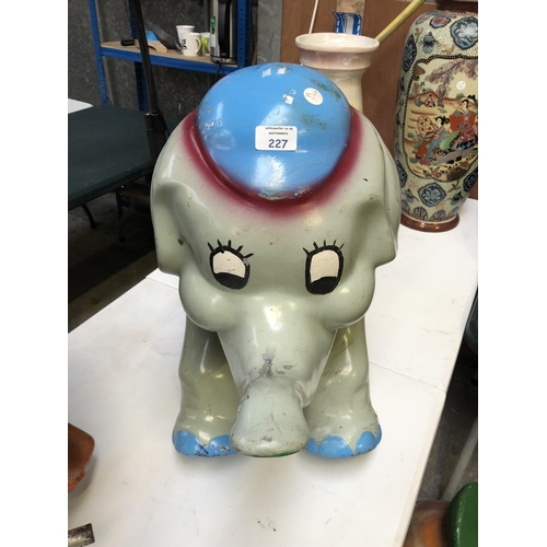 227 - A VINTAGE SEATED FAIRGROUND RIDE MODELED AS AN ELEPHANT, HEIGHT 58CM