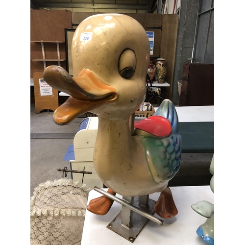 228 - A VINTAGE FAIRGROUND SEATED RIDE MODELED AS A DUCK, HEIGHT 93CM