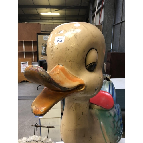 228 - A VINTAGE FAIRGROUND SEATED RIDE MODELED AS A DUCK, HEIGHT 93CM