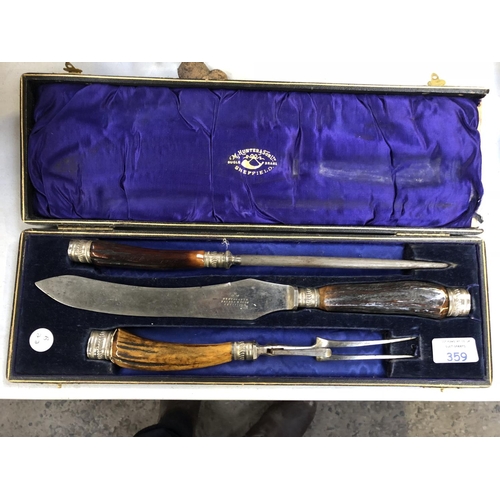 359 - A VINTAGE LEATHER CASED M. HUNTER & SONS OF SHEFFIELD CARVING KNIFE SET