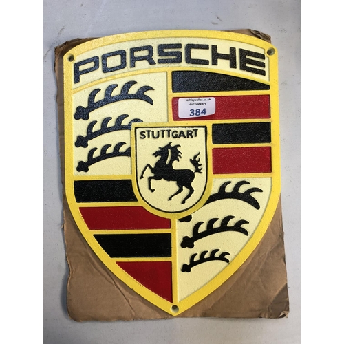 384 - A 'PORSCHE' CAST METAL CREST SIGN