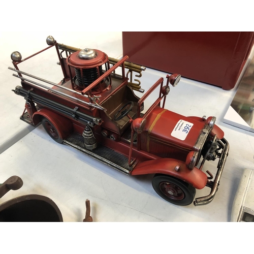 392 - AN UNUSUAL TIN MODEL OF A VINTAGE FIRE ENGINE