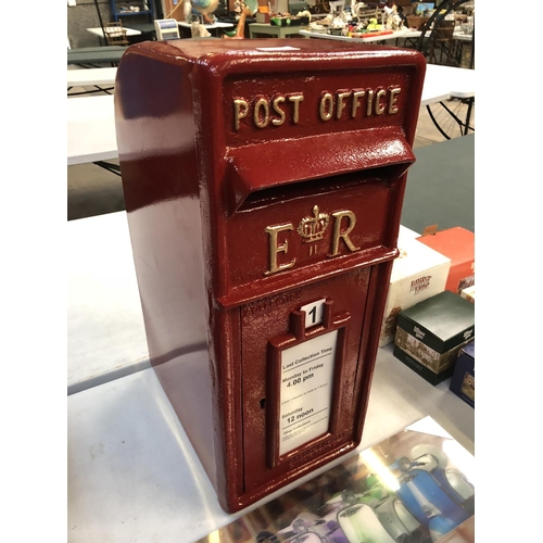 394 - A CAST METAL RED PAINTED POST OFFICE BOX 57CM HEIGHT