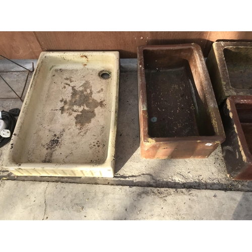 77 - FIVE VINTAGE SALT GLAZED TROUGHS AND A VINTAGE SHALLOW SINK