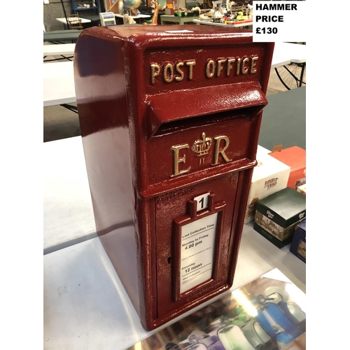 394 - A CAST METAL RED PAINTED POST OFFICE BOX 57CM HEIGHT