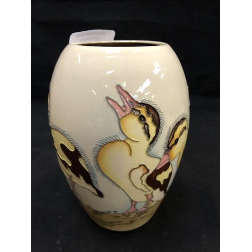 317 - A NUMBERED EDITION (184) MOORCROFT POTTERY VASE DECORATED IN THE 'SPRING DUCKLING' PATTERN DESIGNED ... 