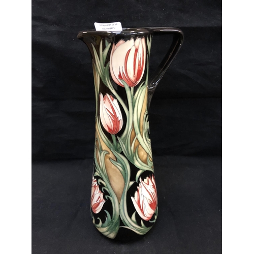 318 - A LIMITED EDITION (30/40) MOORCROFT POTTERY JUG DECORATED IN THE 'RACE AGAINST TIME' PATTERN DESIGNE... 