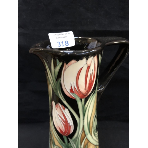 318 - A LIMITED EDITION (30/40) MOORCROFT POTTERY JUG DECORATED IN THE 'RACE AGAINST TIME' PATTERN DESIGNE... 