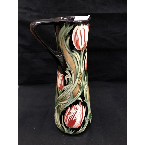 318 - A LIMITED EDITION (30/40) MOORCROFT POTTERY JUG DECORATED IN THE 'RACE AGAINST TIME' PATTERN DESIGNE... 