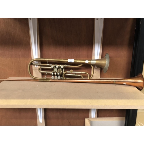 340 - A VINTAGE 'JOSEF GLASSL' BRASS SHORT BUGLE TOGETHER WITH A LONG COPPER HUNTING HORN (2)