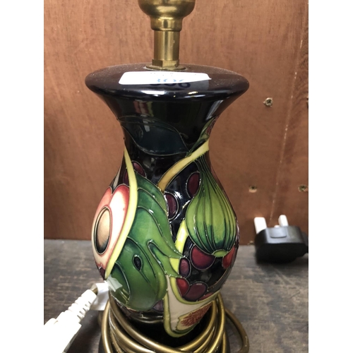 306 - A MOORCROFT POTTERY LAMP BASE DECORATED IN THE 'QUEENS CHOICE' PATTERN DESIGNED BY EMMA BOSSONS, HEI... 