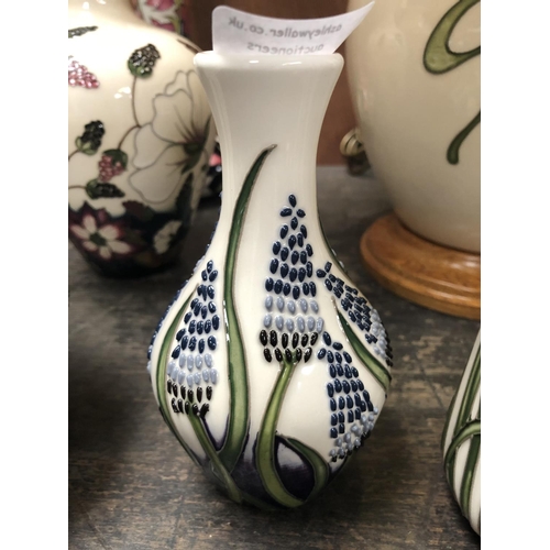 321 - A MOORCROFT POTTERY VASE DECORATED IN THE 'MUSCARI' PATTERN DESIGNED BY ELISE ADAMS, SHAPE NUMBER 37... 