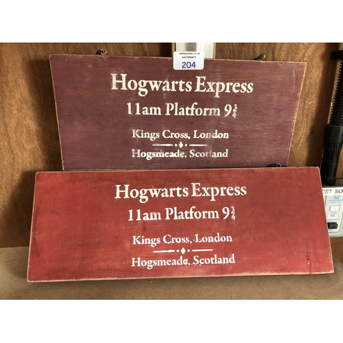 204 - TWO DECORATIVE WOODEN 'HOGWARTS' PLATFORM SIGNS