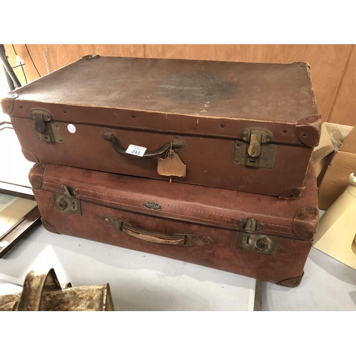 243 - TWO VINTAGE LEATHER TRAVELLING SUIT CASES TO INCLUDE A 'HERCULAX' EXAMPLE, VINTAGE GAMES AND FURTHER... 