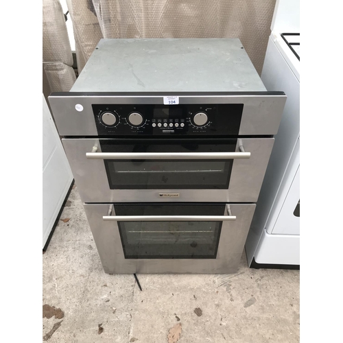 104 - A HOTPOINT BD40 CUPBOARD MOUNTED BRUSHED STEEL OVEN AND GRILL