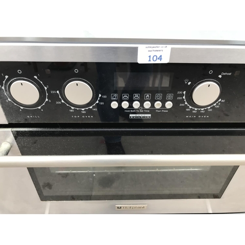 104 - A HOTPOINT BD40 CUPBOARD MOUNTED BRUSHED STEEL OVEN AND GRILL