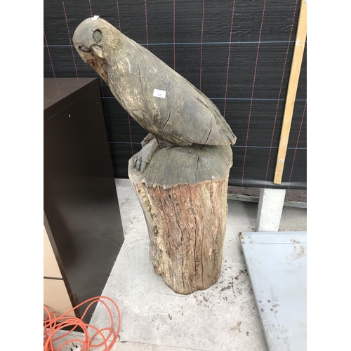 15 - A CARVED TREE STUMP IN THE FORM OF AN OWL