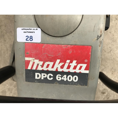 28 - A MAKITA DPC 6400 PETROL MASONRY SAW W/O