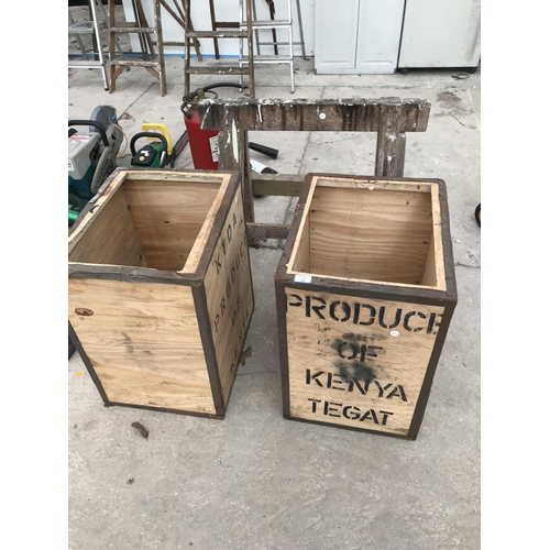 31 - TWO TEA CHESTS AND A JOINER'S TRESTLE