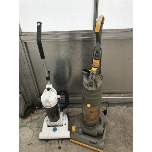 115 - TWO VACUUM CLEANERS - A DYSON DC04 AND A VAX BOTH W/O