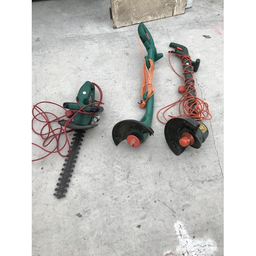 67 - THREE ITEMS - A QUALCAST HEDGE CUTTER AND TWO BLACK AND DECKER STRIMMERS ALL W/O