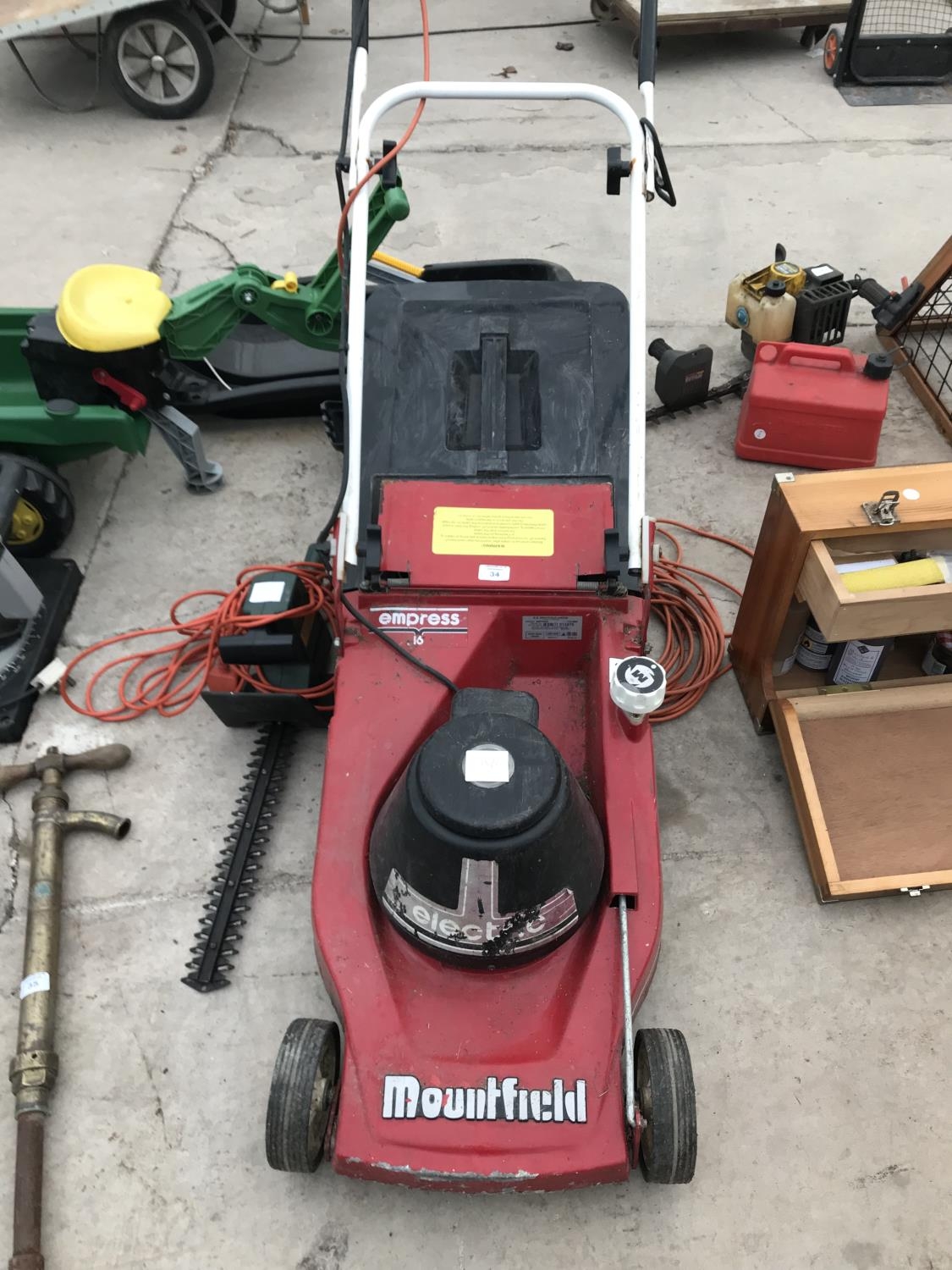 A MOUNTFIELD EMPRESS 16 ELECTRIC LAWN MOWER W O AND A BLACK AND