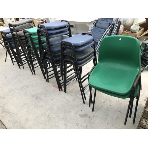 121 - THREE VINTAGE STACKING CHAIRS AND TWENTY NINE STOOLS