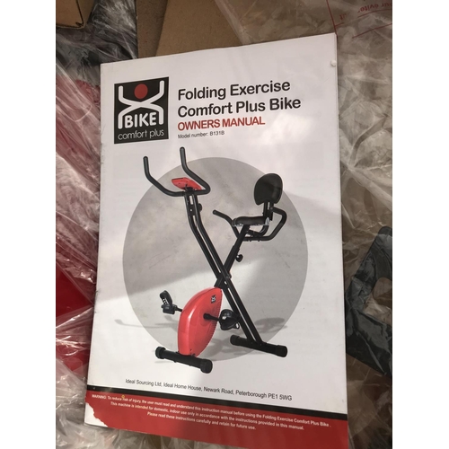 25 - AN AS NEW AND BOXED COMFORT PLUS FOLDING EXERCISE BIKE