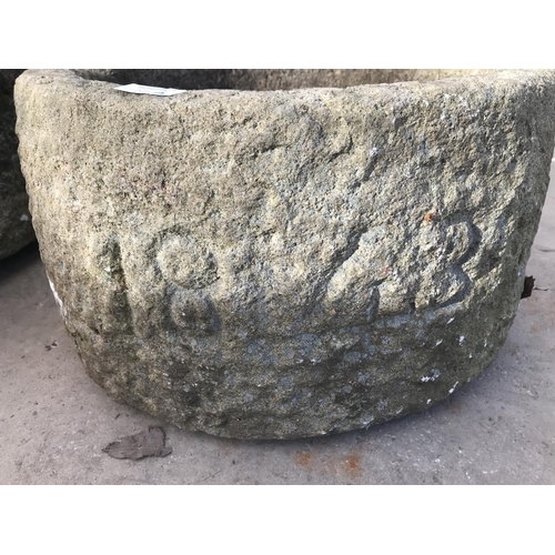 38A - A CIRCULAR STONE TROUGH 46CM DIAMETER AND 27CM HIGH CARVED WITH 1843 JUNE 3