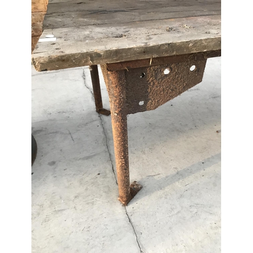 190 - A VINTAGE WOODEN TOP TABLE ON INDUSTRIAL SUPPORTS 184CM X 81CM