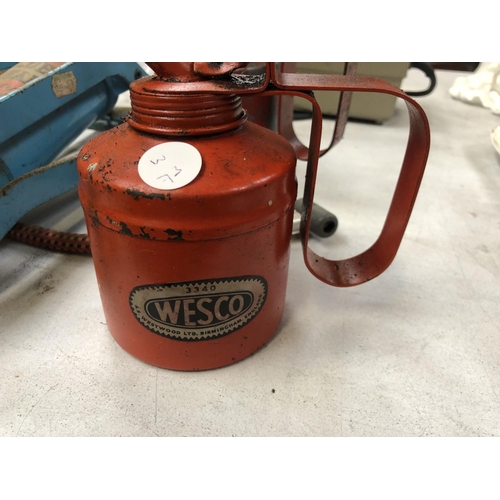 435 - TWO VINTAGE METAL OIL CANS, ONE 'WESCO' AND A GOLDEN TORNADO FOOT PUMP (3)