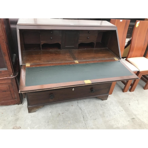 855 - A LARGE INLAID MAHOGANY BUREAU ON BRACKET FEET WITH FALL FRONT AND THREE DRAWERS HAVING BONE ESCUTCH... 