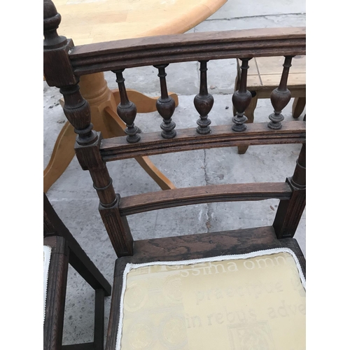 876 - TWO EARLY 20TH CENTURY OAK BEDROOM CHAIRS