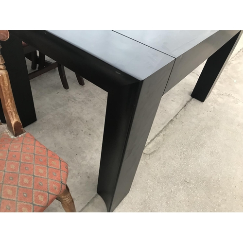 892 - A MODERN BLACK BLACK DINING TABLE ON SHAPED SUPPORTS 183 CM X 90 CM X 78 CM HIGH