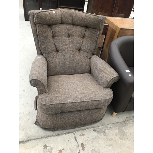 920 - A FABRIC RECLINING ARMCHAIR