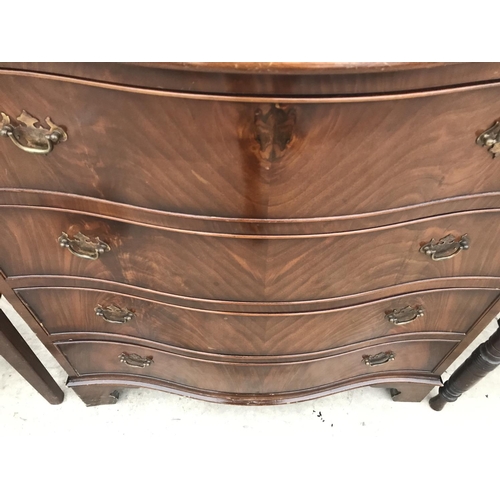 930 - A SERPENTINE FRONT MAHOGANY CHEST OF FOUR DRAWERS