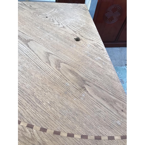 1003 - AN OAK CORNER TABLE (HOLE TO TOP)