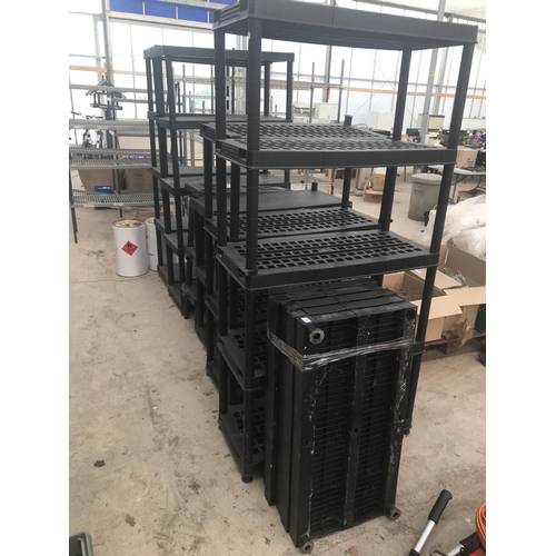 29 - SIX VARIOUS SIZED PLASTIC SHELVING UNITS WITH FIVE SPARE SHELVES