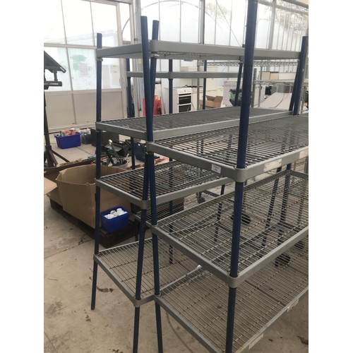 31 - THREE PLASTIC COATED METAL SHELVING UNITS WITH THREE SHELVES EACH (TWO 120CM X 50CM X 167CM HIGH AND... 