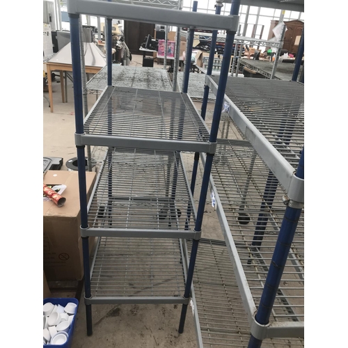 31 - THREE PLASTIC COATED METAL SHELVING UNITS WITH THREE SHELVES EACH (TWO 120CM X 50CM X 167CM HIGH AND... 